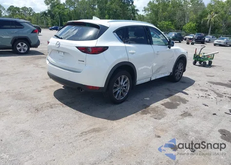 2021 Mazda Cx-5 Grand Touring from USA, damaged, VIN JM3KFADM9M0471104